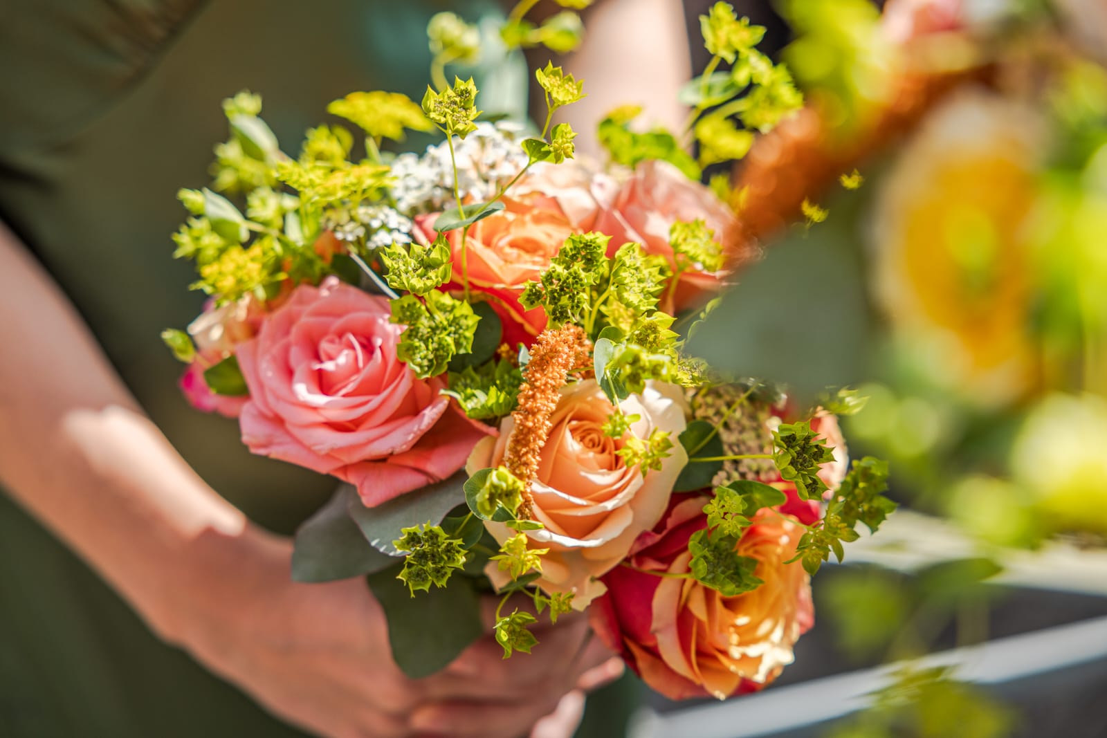 Wedding flowers arranged with herbs and British garden blooms