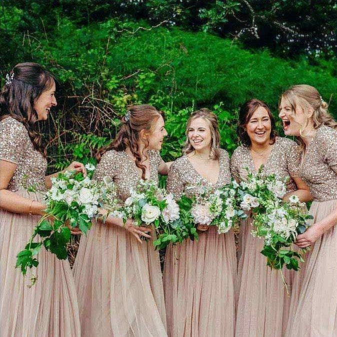Bridesmaids holding bouquets