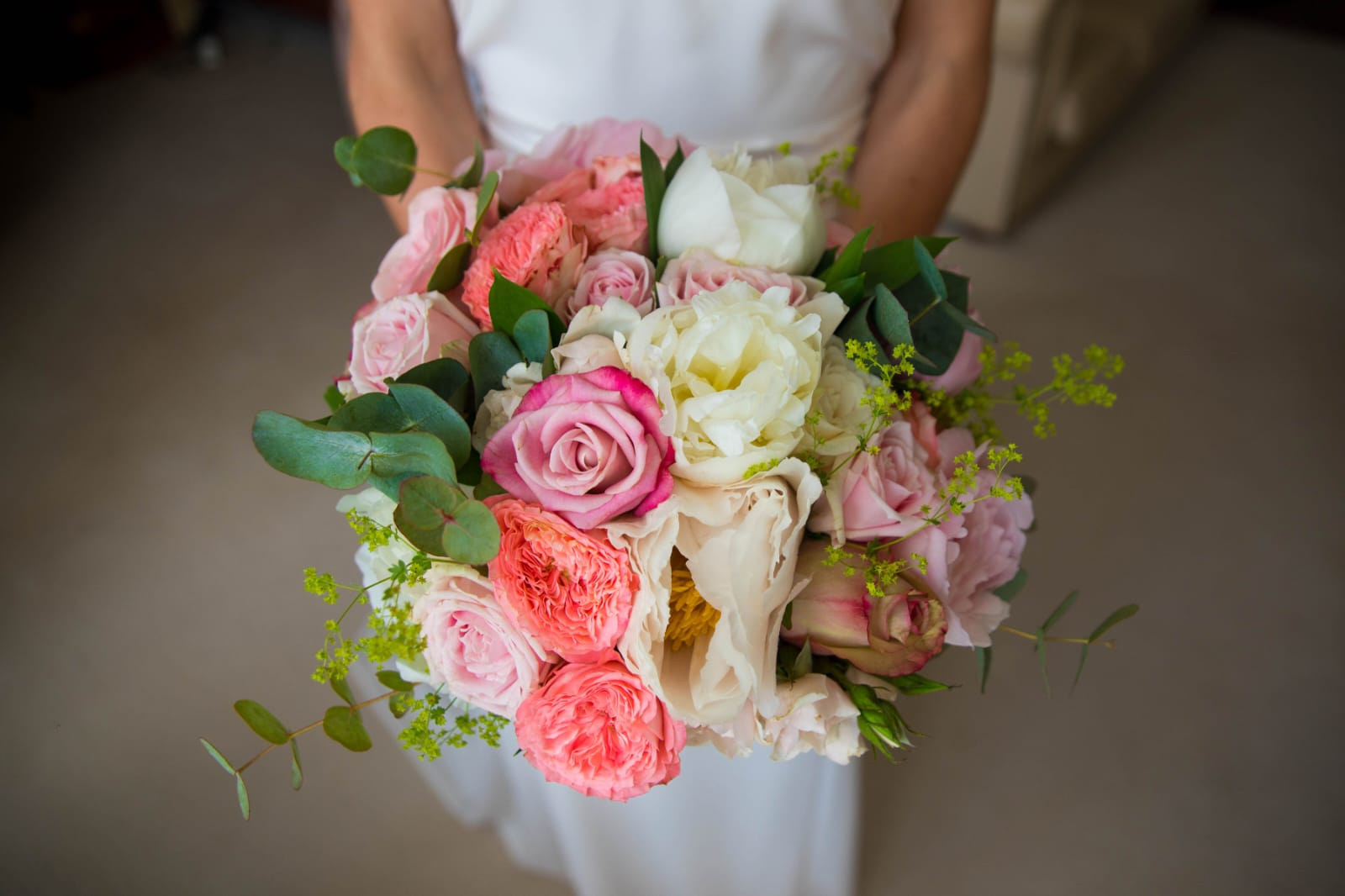 Reception table detail with bud vases and candles