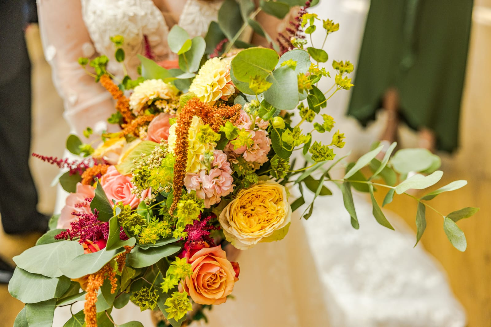Wedding flowers in soft seasonal colours with wild foliage